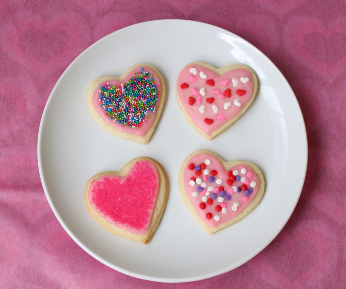 Four pink heart-shaped cookies