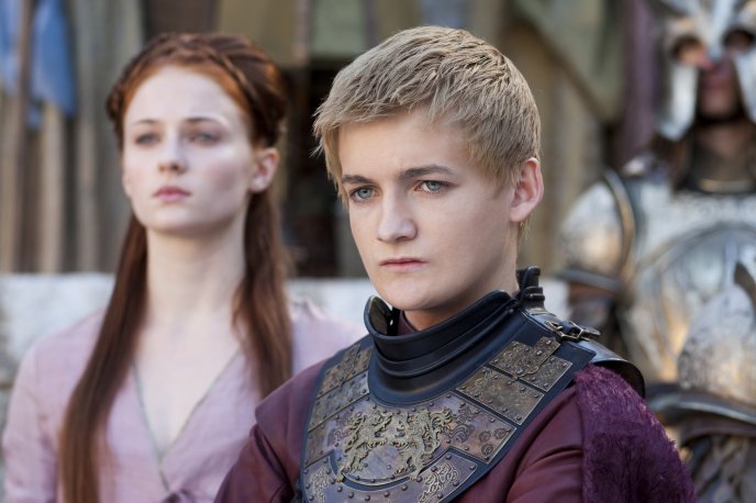 Jack Gleeson as Joffrey Baratheon with his queen-Sansa Stark
