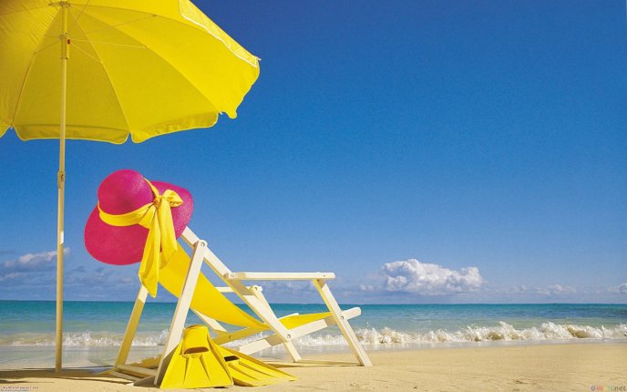 Summer time - summer chair on the beach