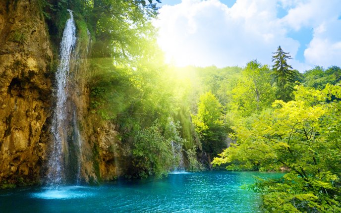 Beautiful waterfall in sunlight