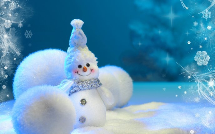 Small snowman and three big snowballs HD wallpaper