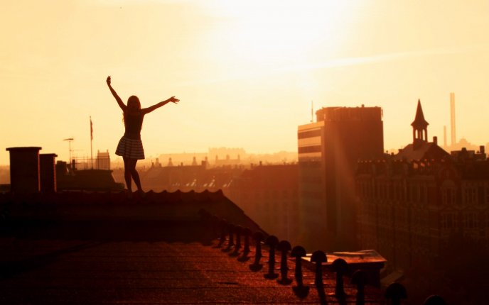 A girl on a rooftop at dawn HD wallpaper