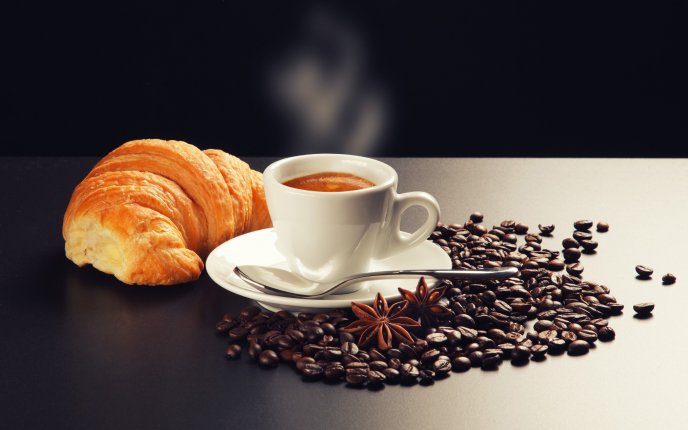 Croissant and coffee - perfect breakfast