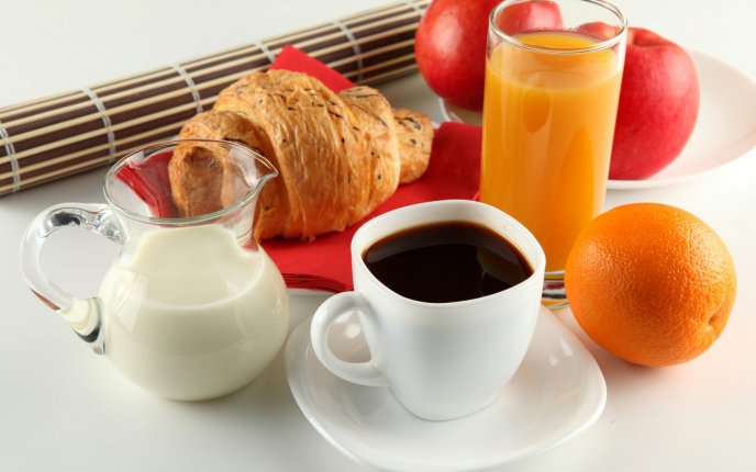 Delicious and healthy breakfast - juice, milk and coffee