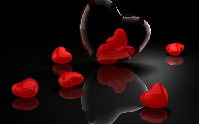 Glass hearts on a shiny floor