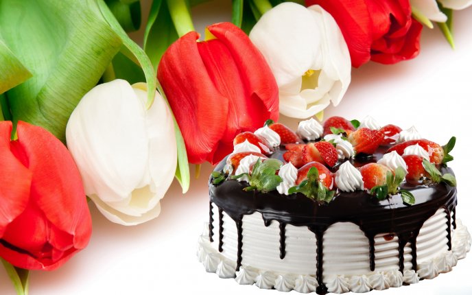 Delicious strawberry and chocolate cake - beautiful tulips