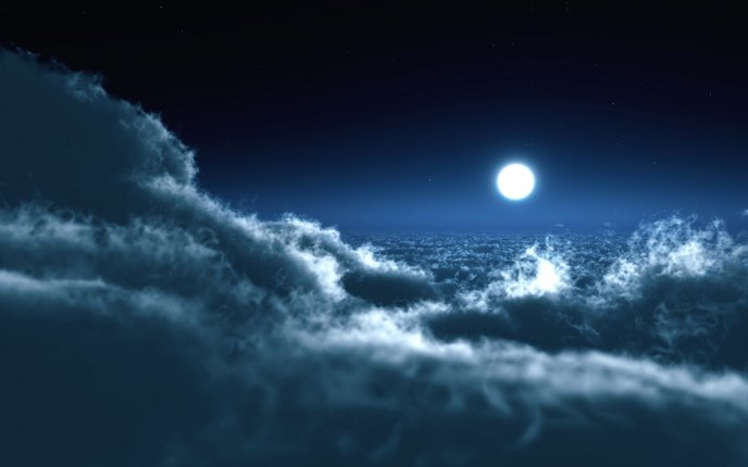 The moon is hiding above the clouds
