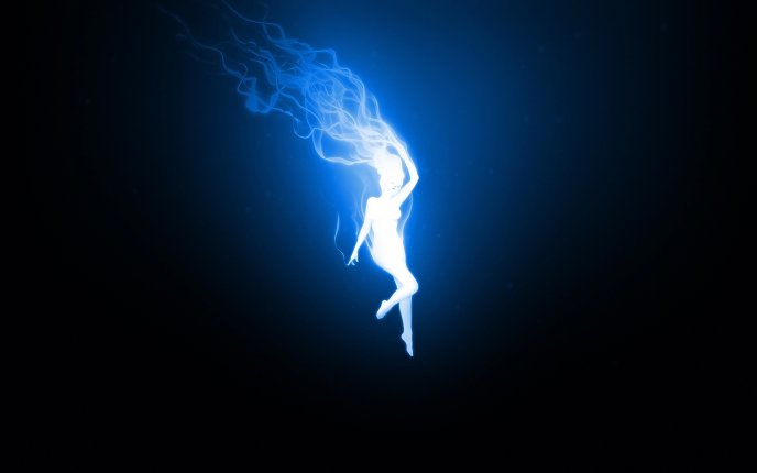 A woman created from blue smoke - abstract wallpaper