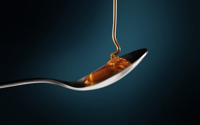 Spoon full with honey - HD wallpaper