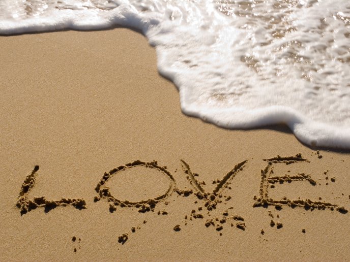 Love message on the beach - see foam