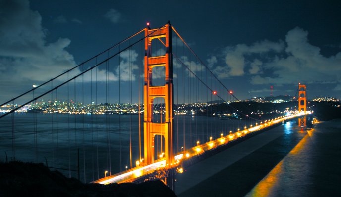 Beautiful bridge lit up on night - HD wallpaper
