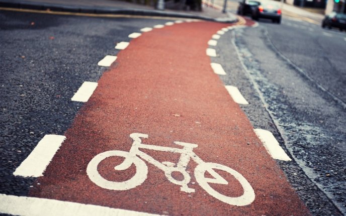 Red road only for bicycles - spend your day doing sport