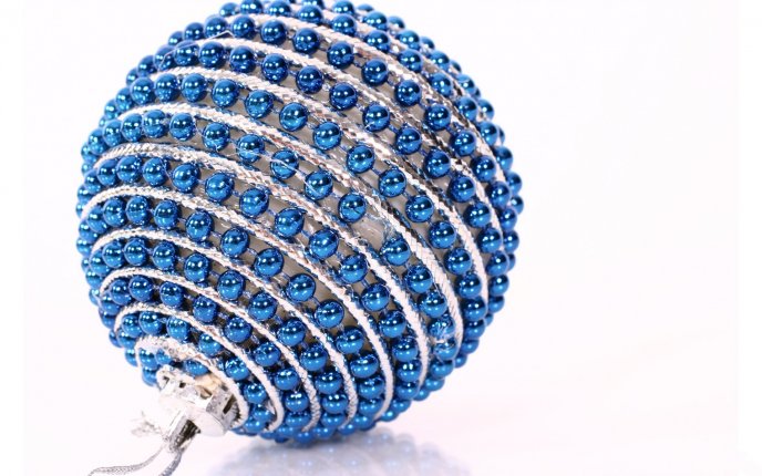 Fir globe with many blue balls