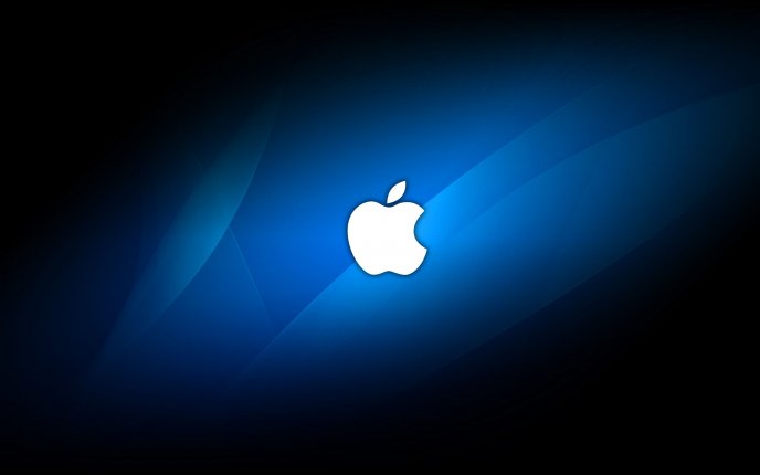 White apple logo on blue and black background
