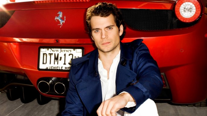 Cool Henry Cavill near the red car