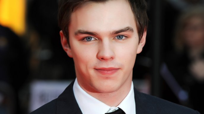 The actor Nicholas Hoult with blue eyes