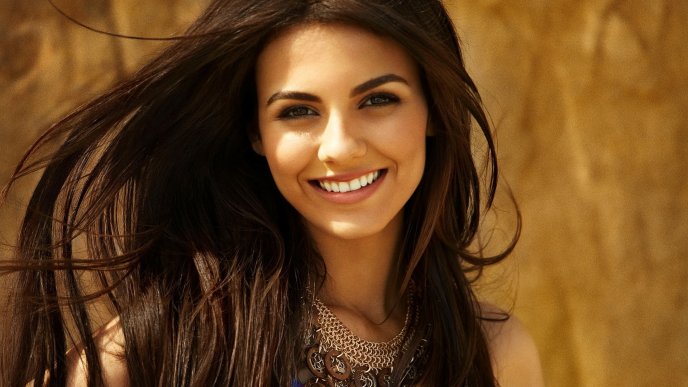 Victoria Justice with a smile on face