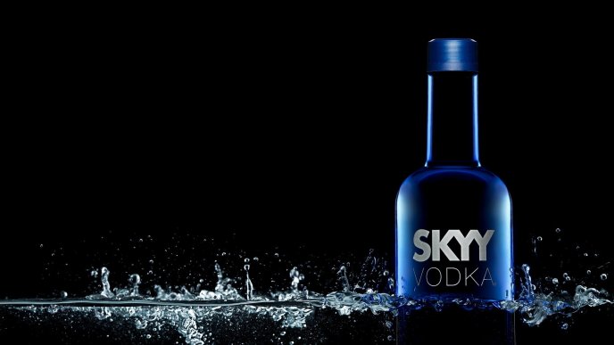 Skyy Vodka Drink - Blue bottle in water