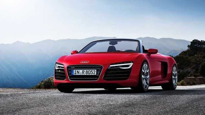 Red Audi R8 Spyder in the mountains
