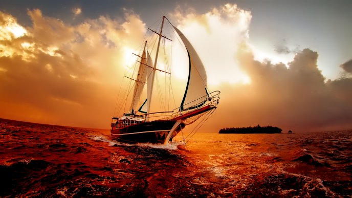 Boat on the ocean in the sunset - wonderful colors