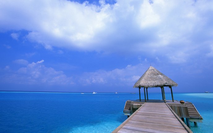 Wooden pavilion in the middle of the blue ocean - Wonderful