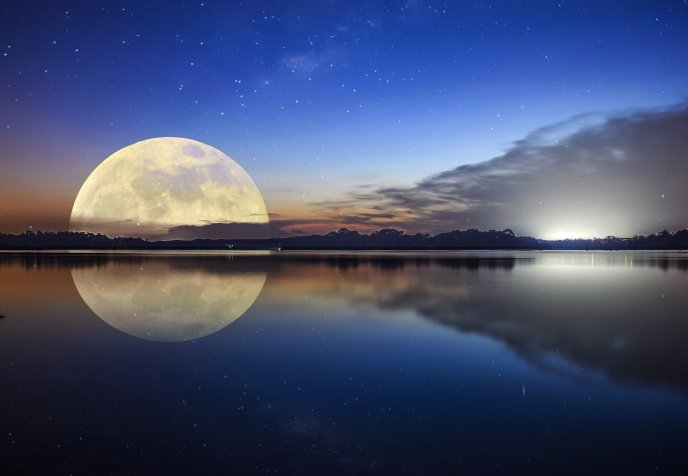 Big moon reflection in the lake - Wonderful mirror effect