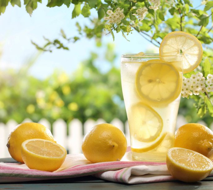 Fresh lemon juice in a hot summer day - Drink more