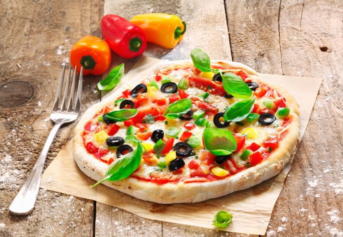 Pizza homemade with basil and pepper - Delicious food