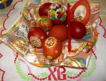 Red painted eggs on table