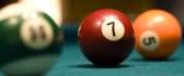 Red billiard ball number 7