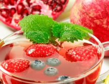 Fresh drink - strawberry, pomegranate, cranberries and mint