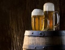 Two mugs of beer on a barrel - HD wallpaper