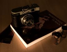 An old camera and book about photography