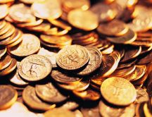 Lots of golden coins - money