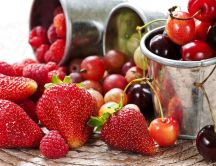 Delicious spring fruit - strawberries and cherries