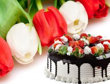 Delicious strawberry and chocolate cake - beautiful tulips