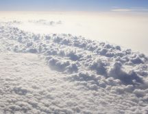 View of  a fluffy carpet of clouds