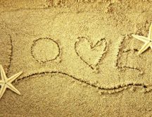 Love message on the sand - holiday at seaside