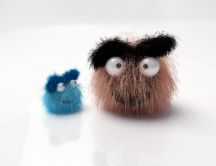 Two little fluffy monsters - funny colored wallpaper