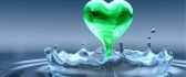 Abstract HD wallpaper - a green heart coming out from water