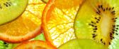 Delicious wallpaper - slices of orange and kiwi on the wall