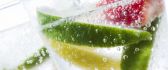 Delicious lemonade with mineral water - macro water drops