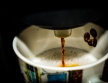Fresh hot coffee from an espresso - the morning drink