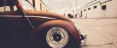 Old classic car - Volkswagen Beetle on the road