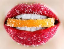 Sweet lips full of sugar - delicious slice of orange