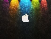 Coloured lights and the apple logo on the wall