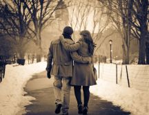Walk in the park in winter - beautiful lovers