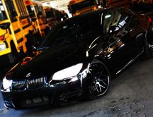 Shiny black car - BMW E92 335i - high speed
