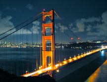 Beautiful bridge lit up on night - HD wallpaper