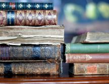 Old books in a library - HD wallpaper